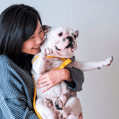 Picture of woman holding dog